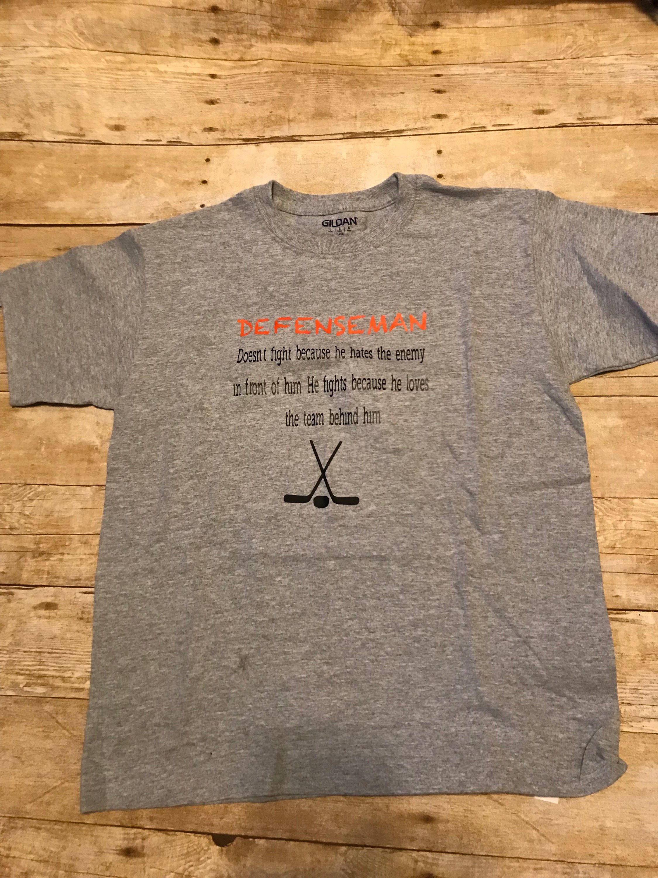 Defenseman Hockey | The Enforcer- Youth Unisex Crewneck T-shirt